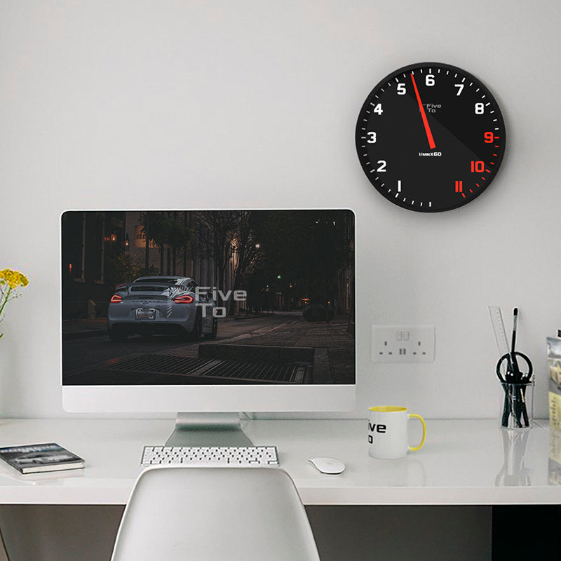 Time is 5.25 Tacho Wall Clock home office scene. Timekeeping redesigned in the style of a sports car rev counter. Only available from www.FiveTo.co.uk