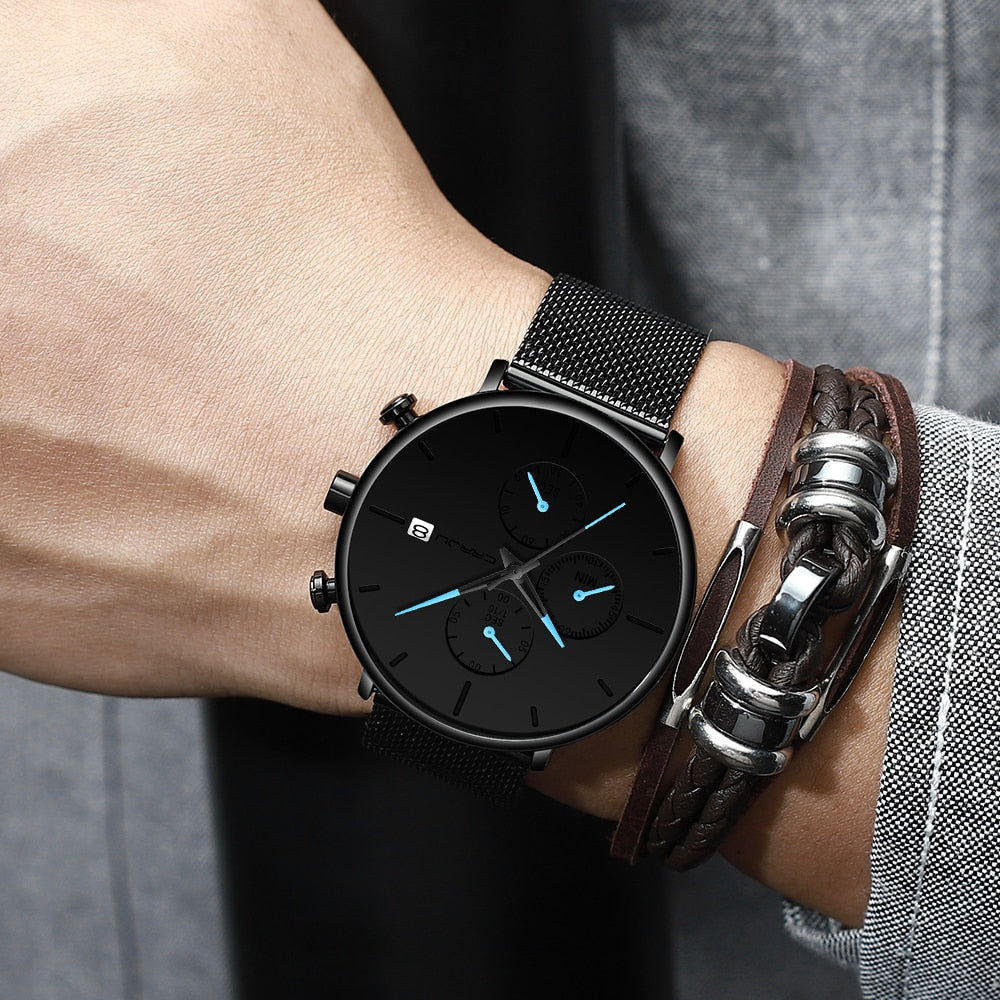 Wrist with Blue/Black Crrju Model 2268 Minimalist Quartz Watch Slim Steel Mesh Strap from fiveto.co.uk