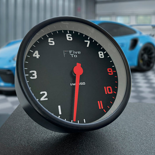 FiveTo Tacho desk clock GT3 garage. Timekeeping redesigned in the style of a sports car rev counter. Exclusively from Fiveto.co.uk