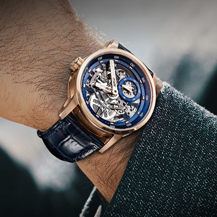 Blue/Gold on wrist Jinlery Automatic Mechanical Skeleton style Watch from fiveto.co.uk
