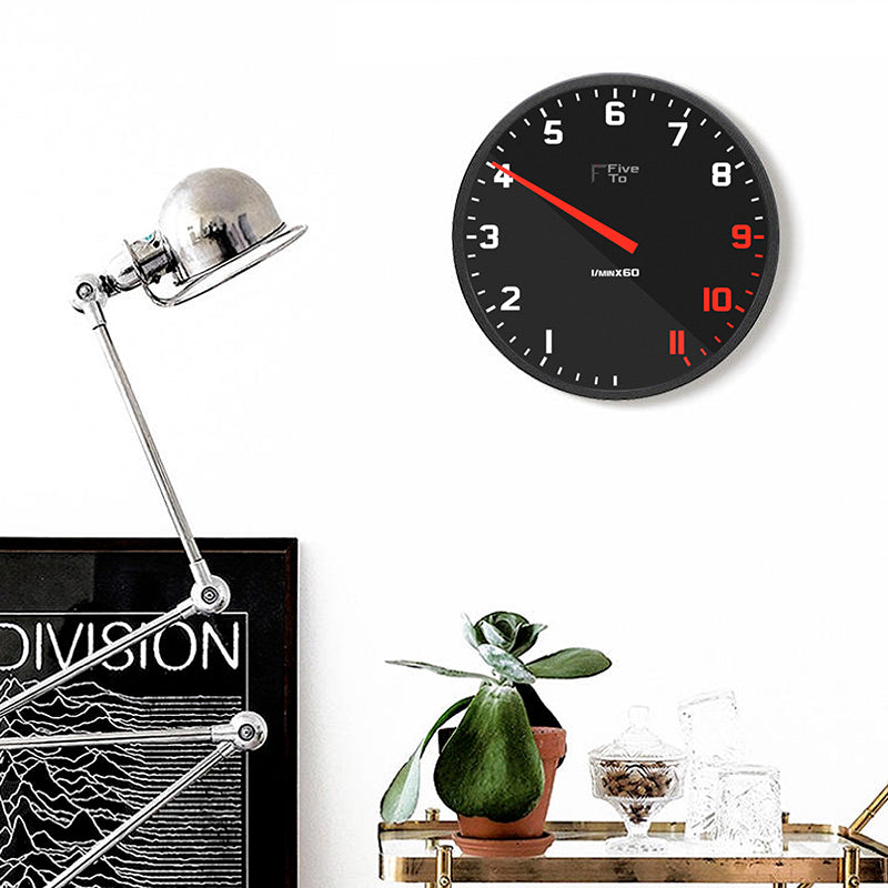 The Time is 4.05 Tacho Wall Clock with Joy Division Poster. Timekeeping redesigned in the style of a sports car rev counter.Exclusively available from www.FiveTo.co.uk